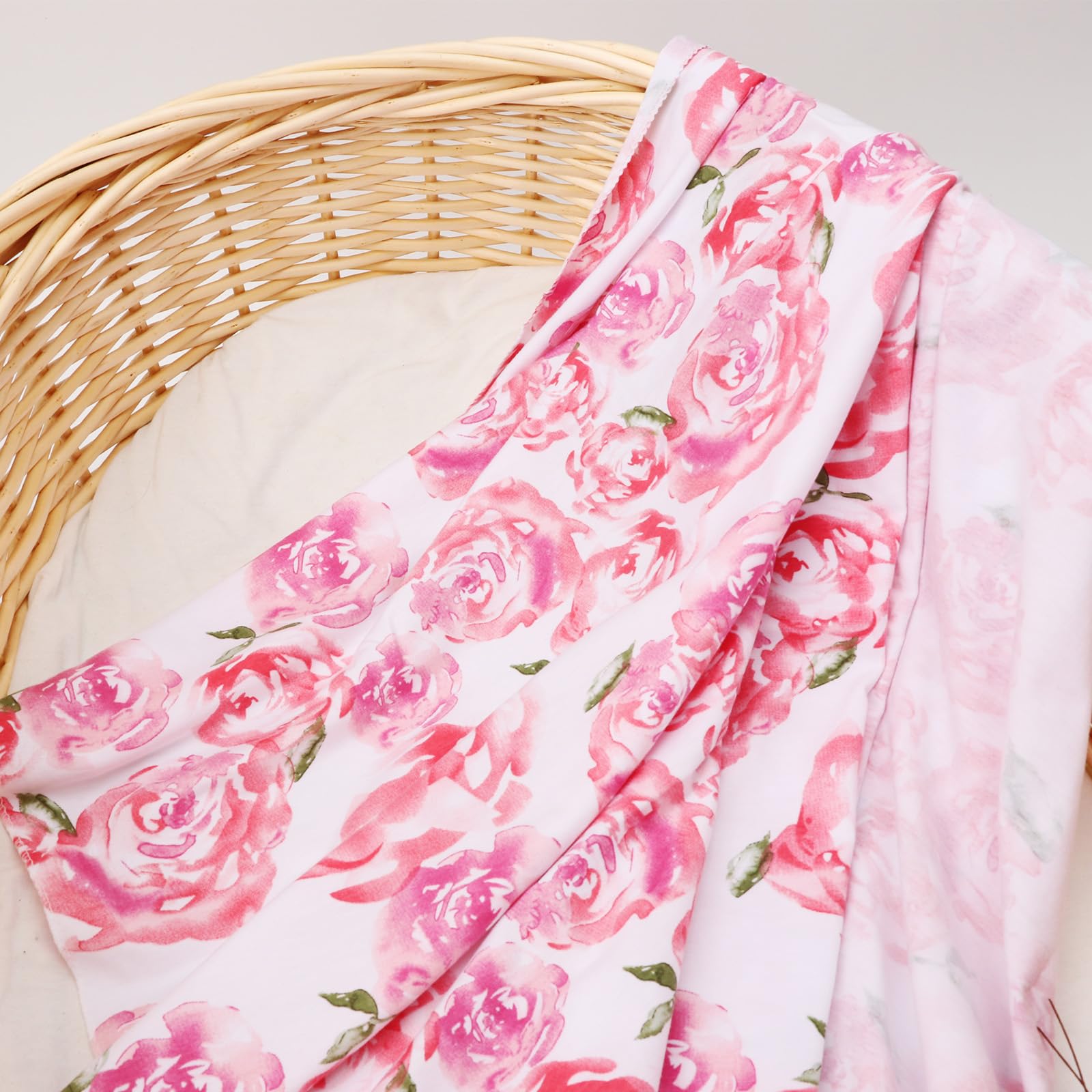 DRESHOW BQUBO baby swaddled in blanket demonstrates secure snug wrap