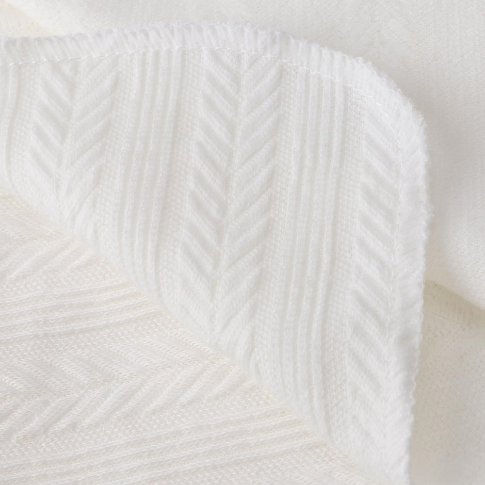 DRESHOW BQUBO bow headband in white, stylish and gentle on baby.
