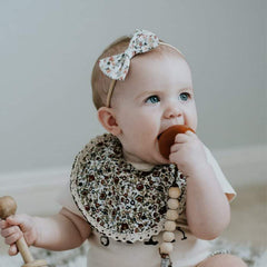 DRESHOW BQUBO handmade fabric bow detail enhances baby styling with delicate craftsmanship.