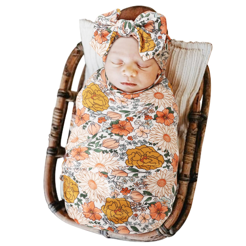 DRESHOW BQUBO headband set complements the floral blanket for baby photos