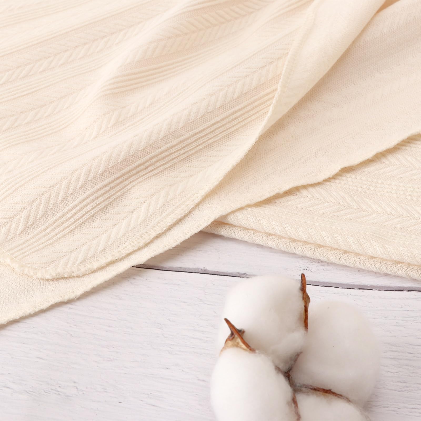 DRESHOW BQUBO multi-use swaddle blanket for nursing covers and sun shade.