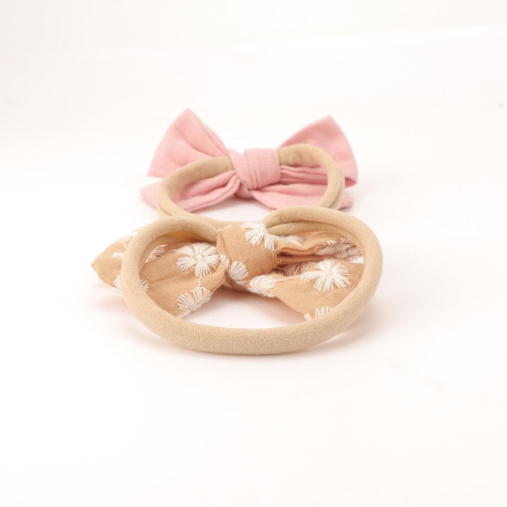 DRESHOW BQUBO newborn photography friendly headband with retro bow detail.