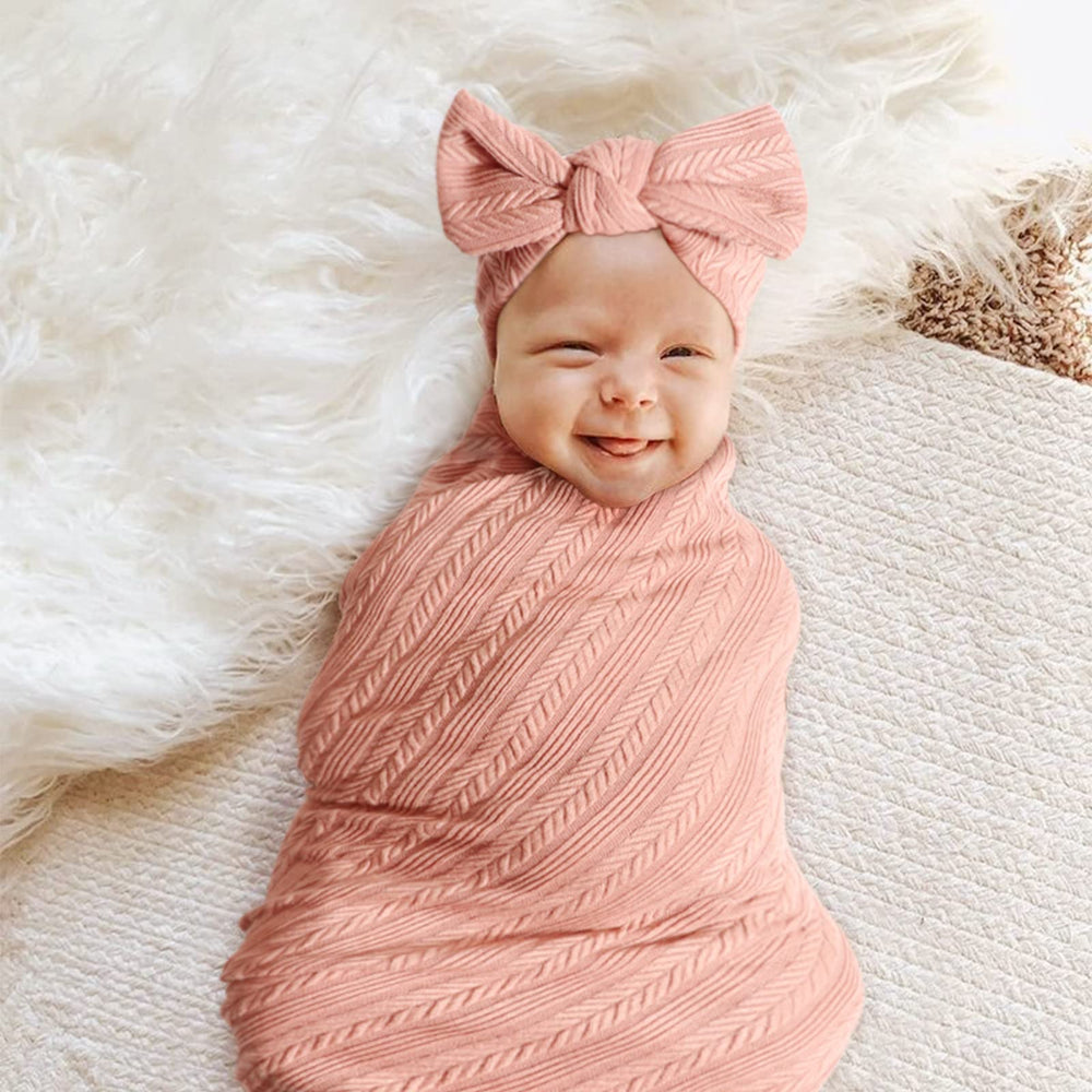 DRESHOW BQUBO newborn swaddle wrapped securely for calming sleep and cozy security.