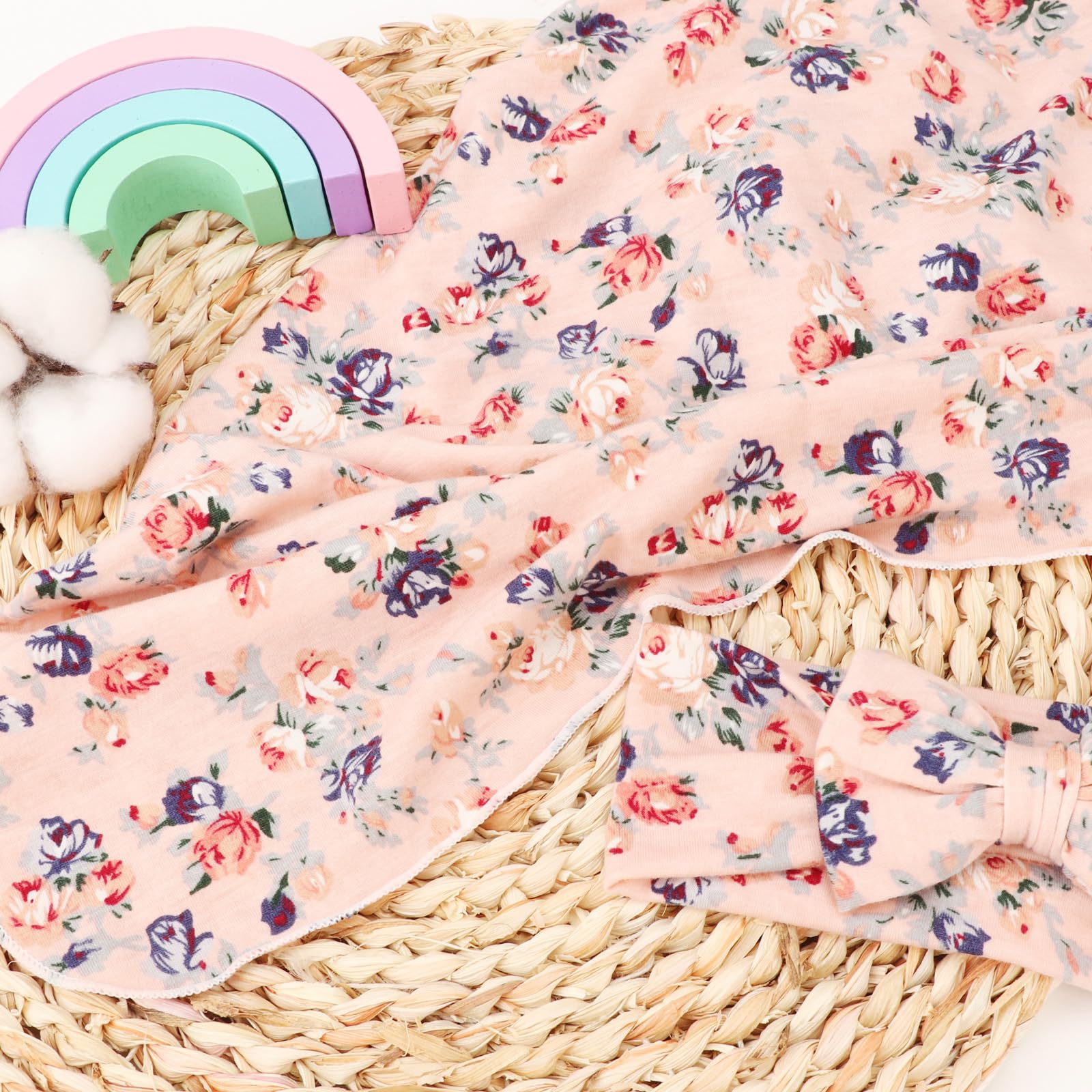 DRESHOW BQUBO blanket with floral print ready for photography sessions.