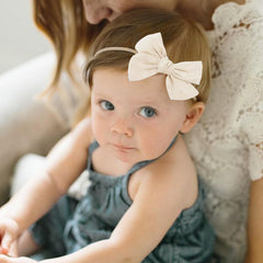 DRESHOW BQUBO soft nylon headband offers gentle stretch and comfort.