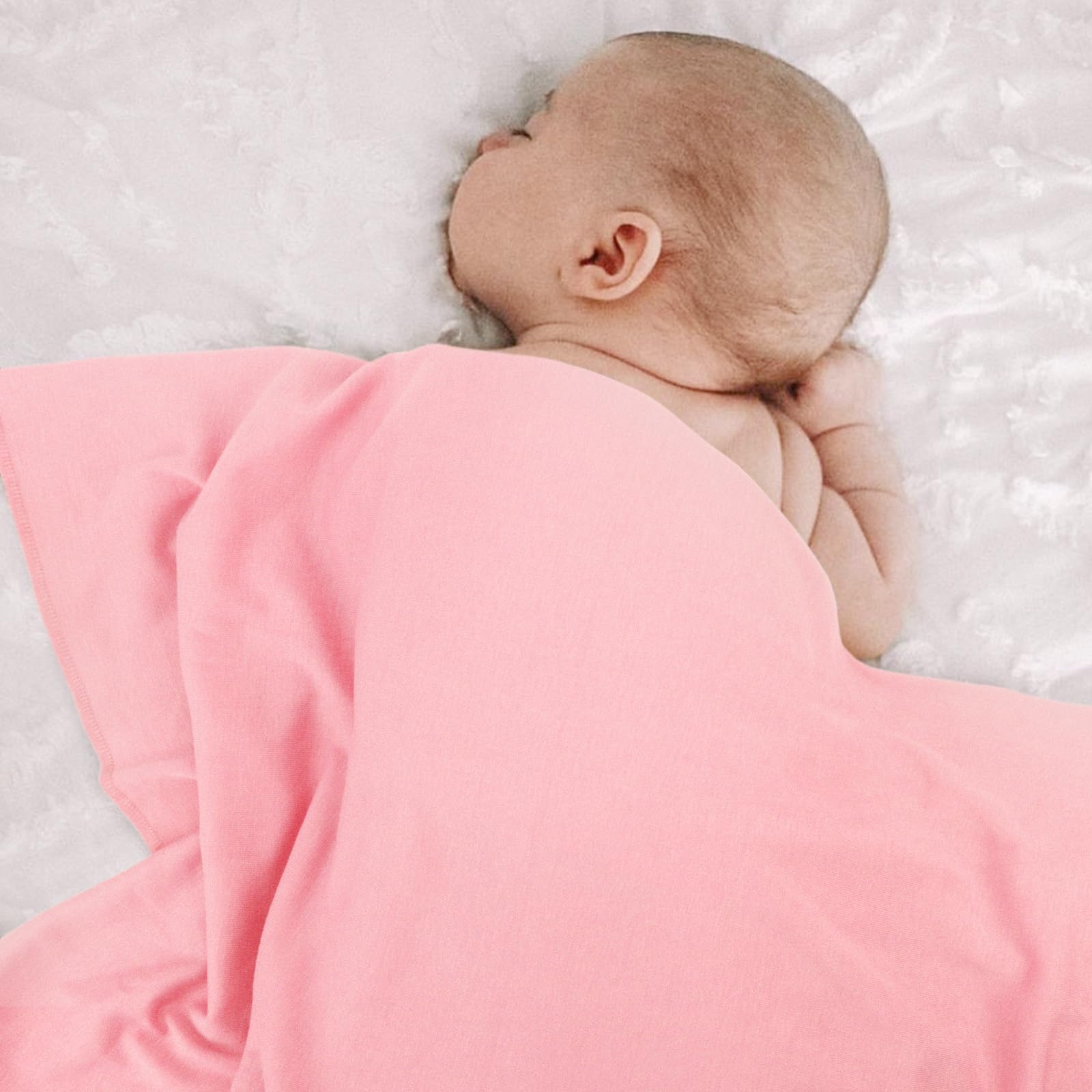 DRESHOW BQUBO swaddle worn in hospital for calm newborns.