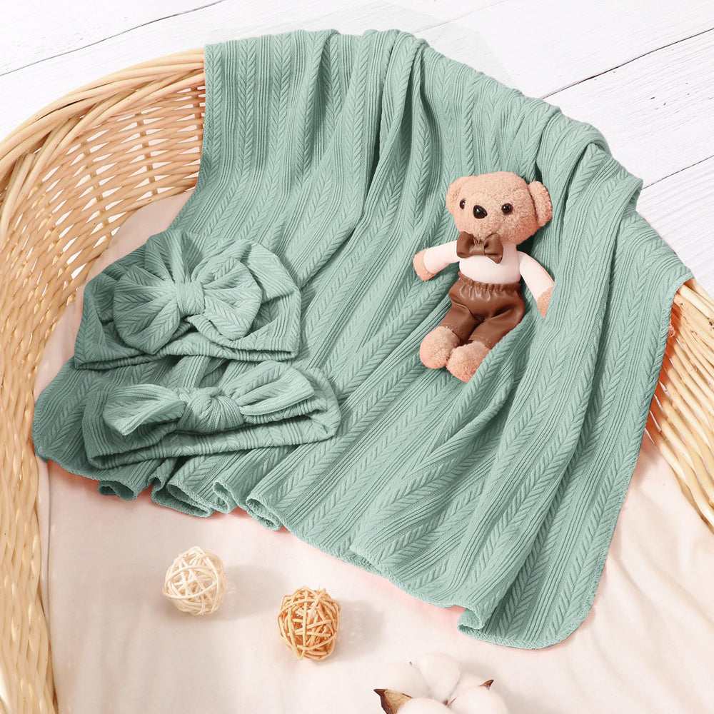 DRESHOW BQUBO textured-knit blanket detail for warmth