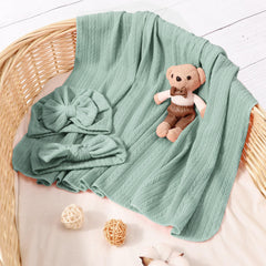DRESHOW BQUBO textured-knit blanket detail for warmth