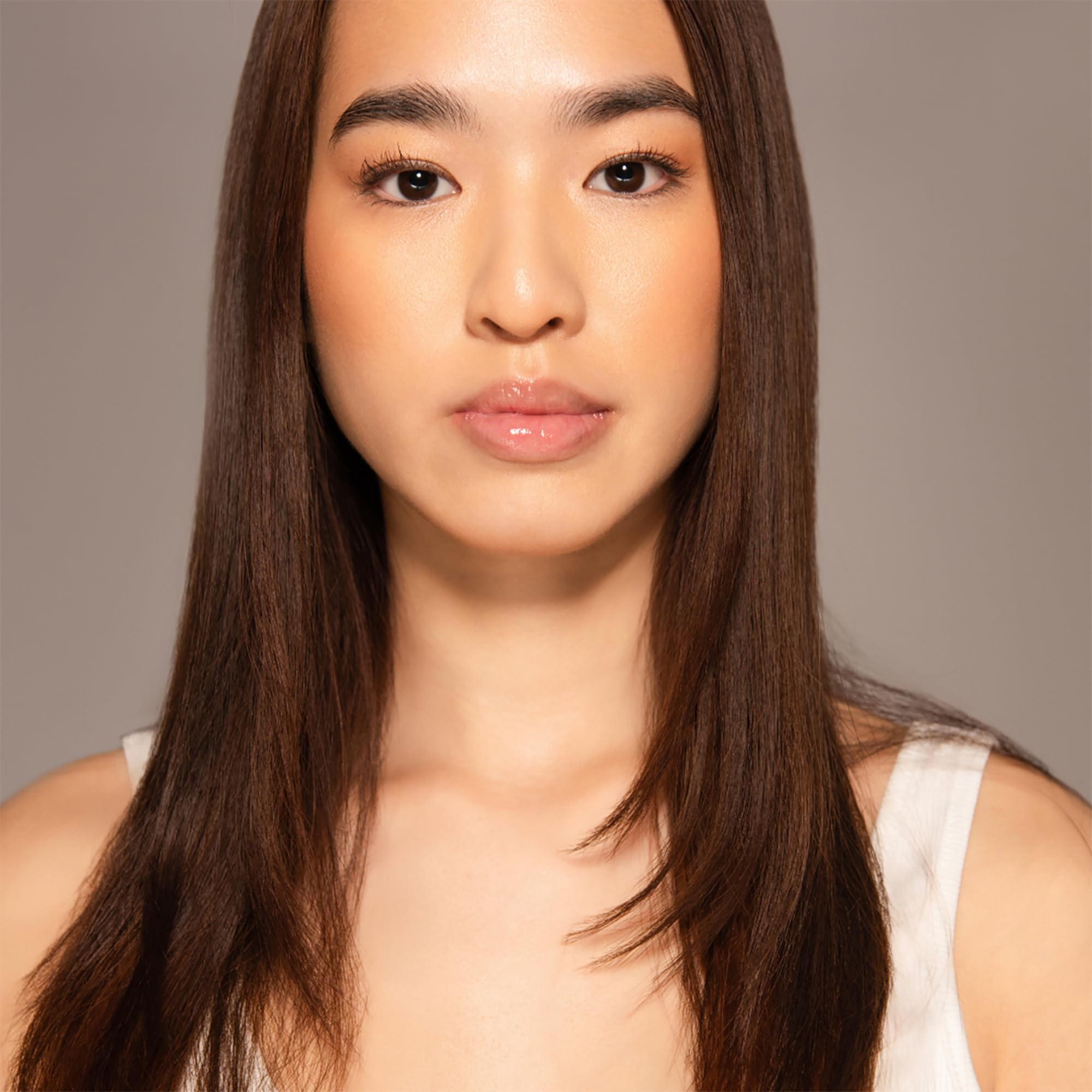 Dr. PawPaw Multipurpose Balm used to tame flyaways and shape brows