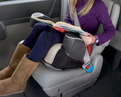 DS Distinctive Style red belt holder in use simplifying buckling for kids