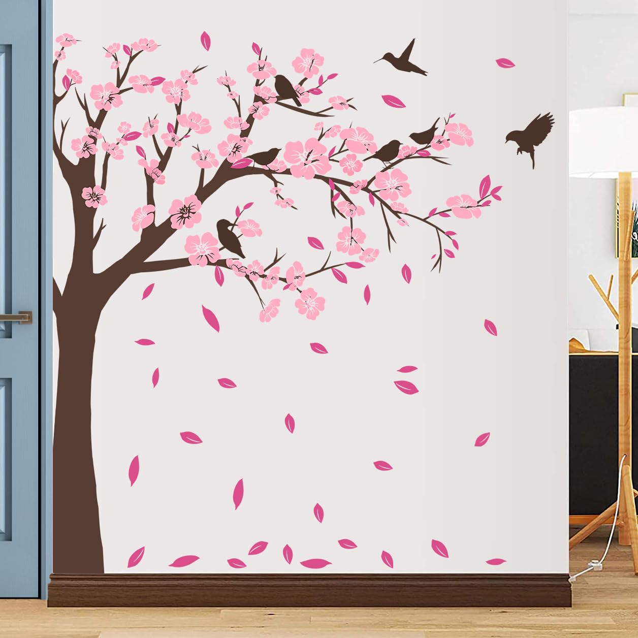 DTLIFEK pink petals tree wall sticker enhances room ambiance with soft color.