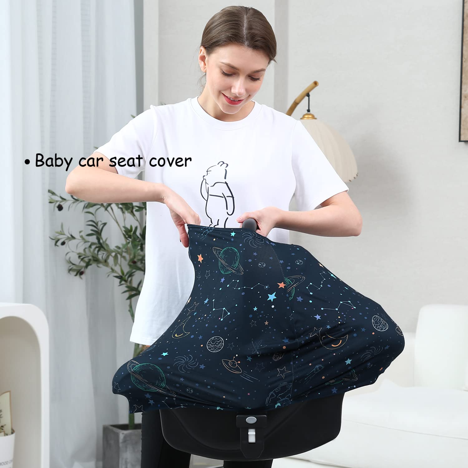 Dudeeghes breastfeeding cover in navy space print provides private feeding in public.
