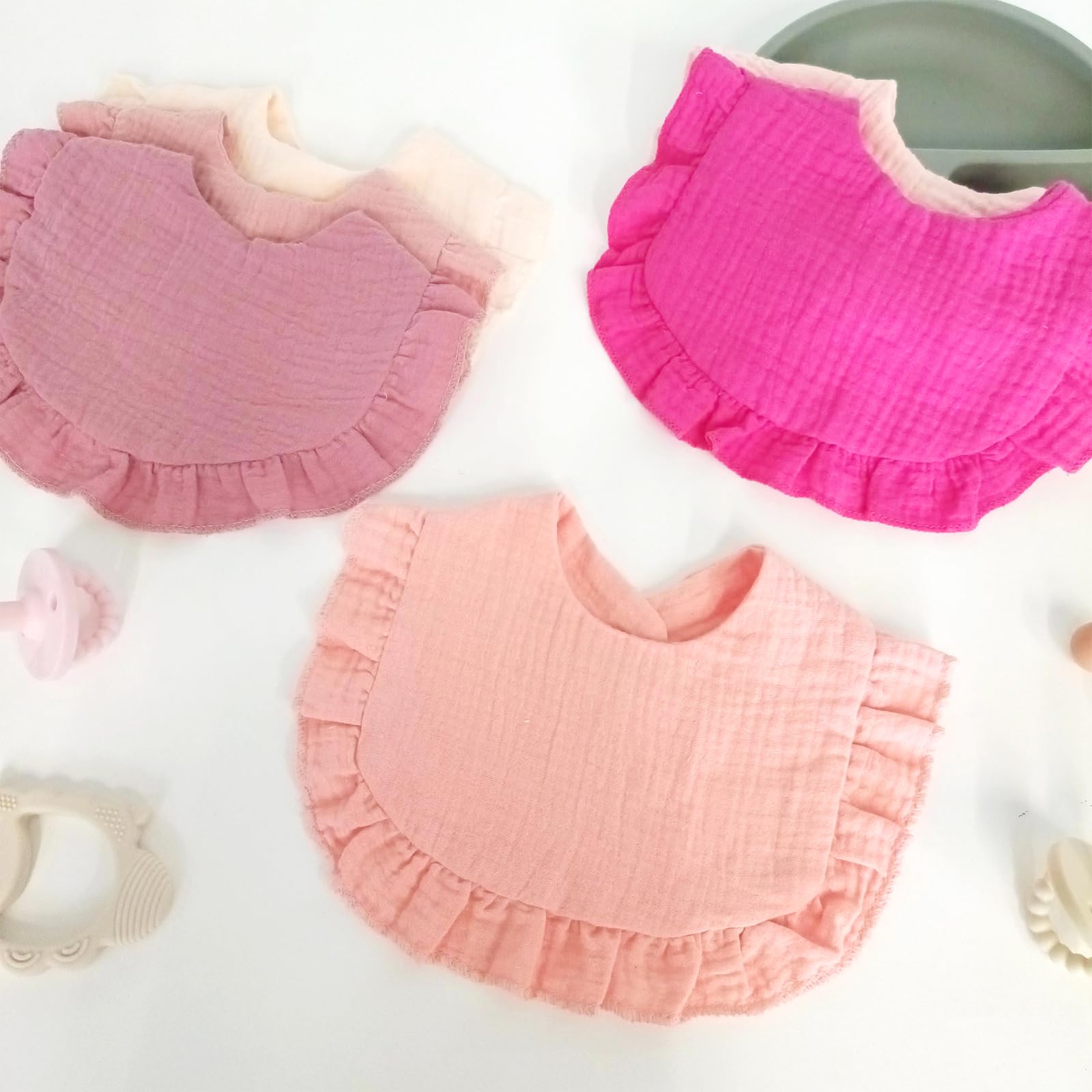 duludulu imported muslin bibs offer skin-friendly comfort.