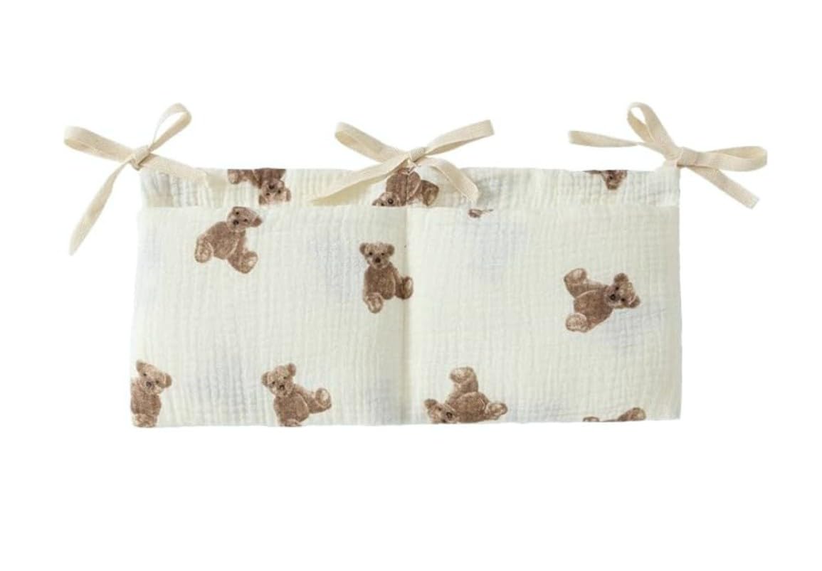 Dwuww white bedside hanging bags holding milk bottles for easy access