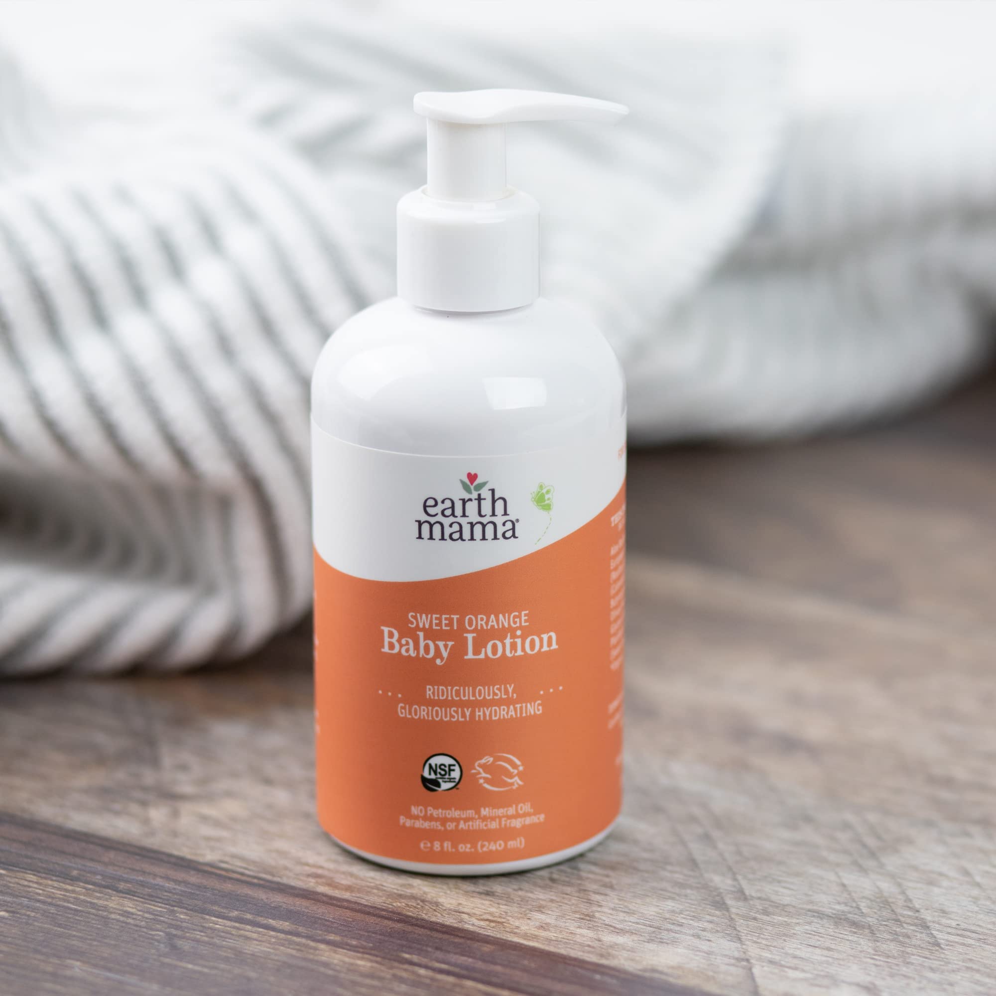 Family skincare moment with Earth Mama Sweet Orange Baby Lotion.