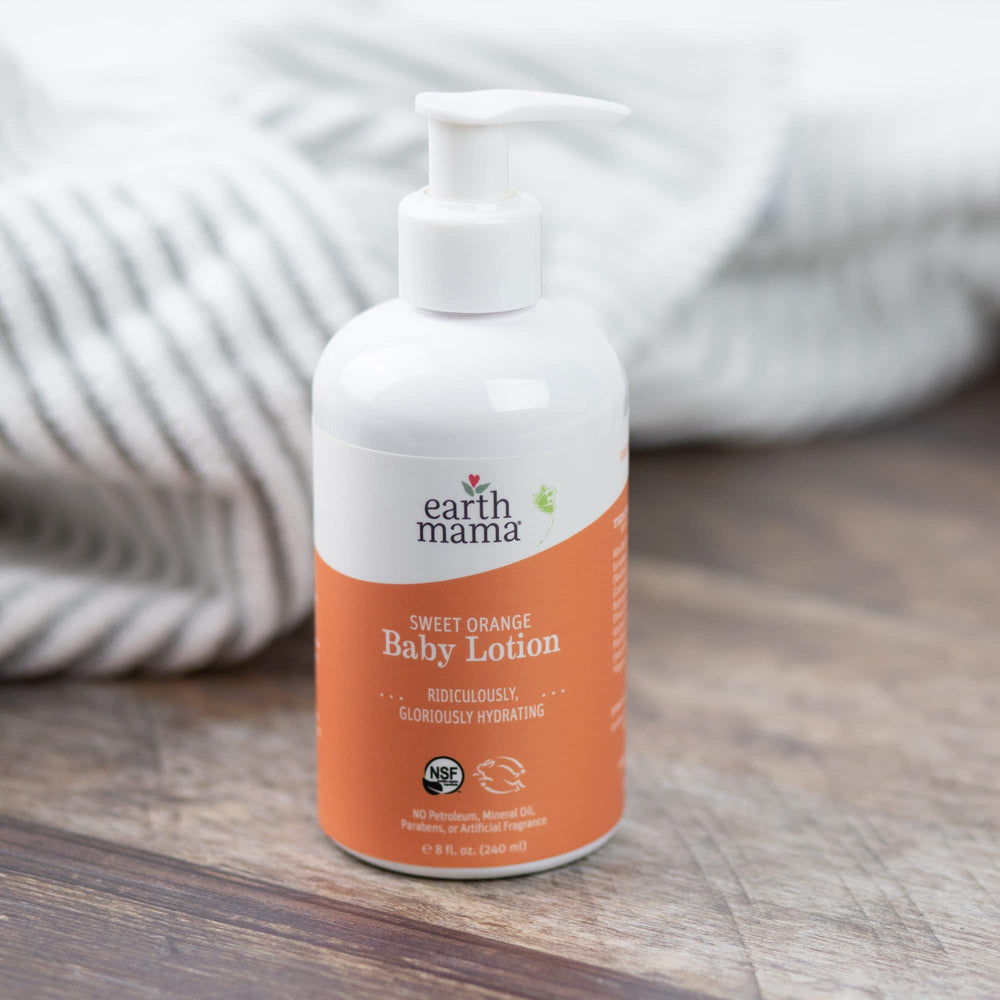 Family skincare moment with Earth Mama Sweet Orange Baby Lotion.