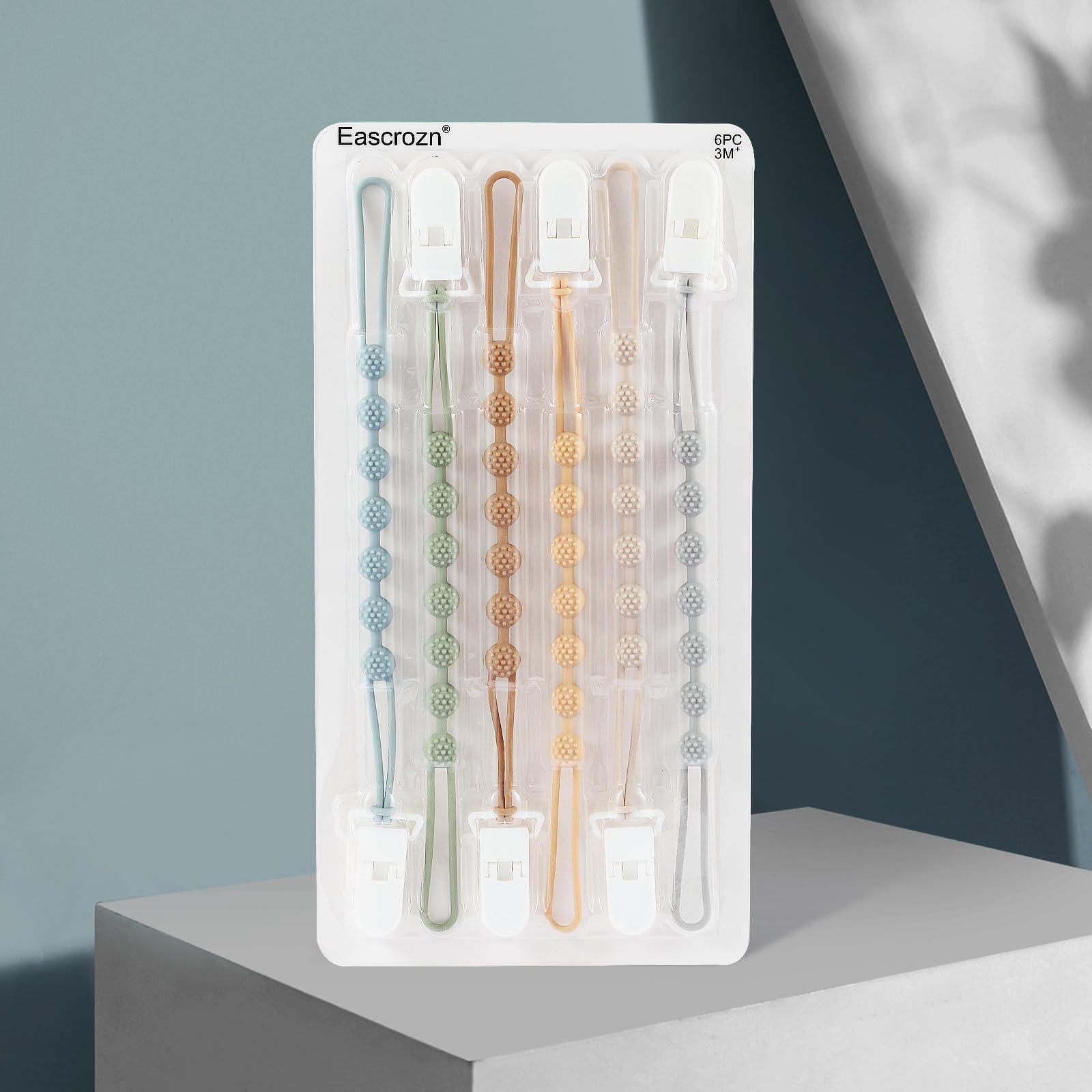 Eascrozn travel-friendly pacifier clip stays within reach on the go.