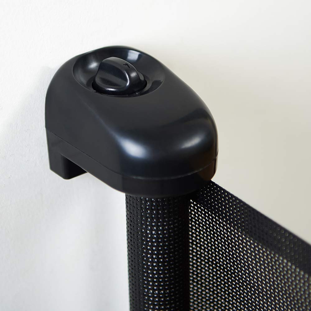 EasyBaby gate mounted at stair bottom in doorway for controlled access
