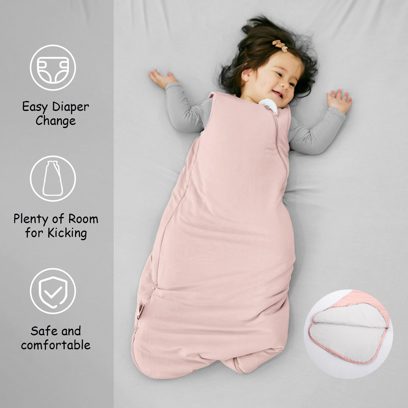 EasyFi pink sleep sack in bed setting demonstrates all-year warmth and breathable fabric.