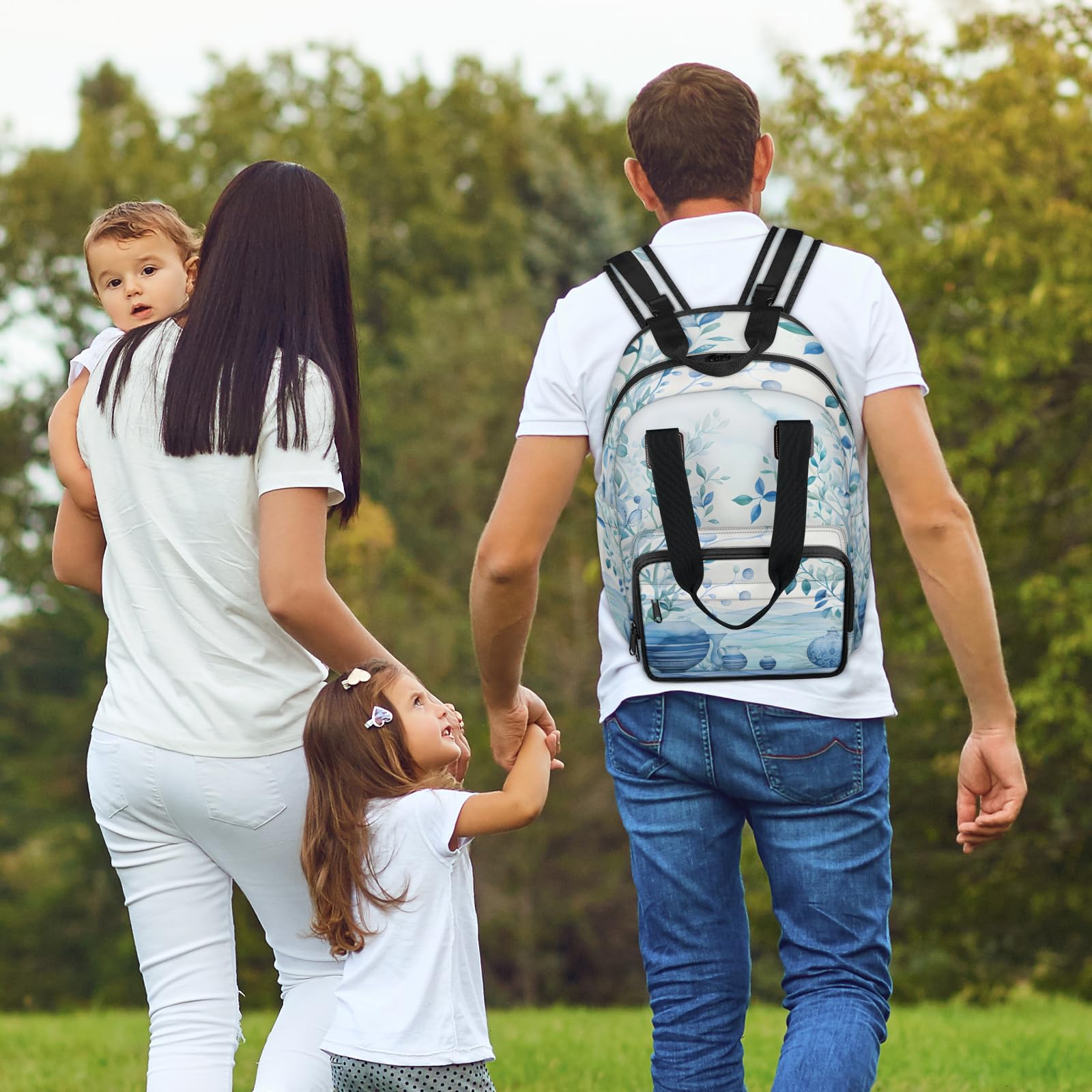 Stroller strap and luggage sleeve on the Eativisa diaper bag for easy attachment on trips.