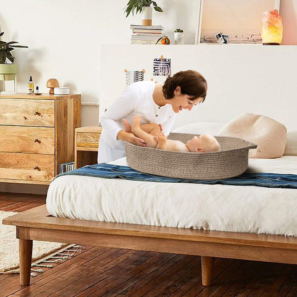 Ecoade boho nursery decor basket used as a diaper caddy.