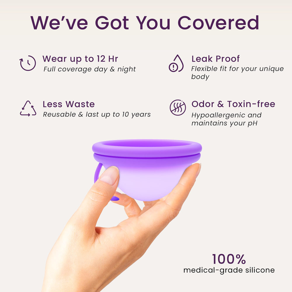 EcoBlossom small violet disc being inserted for comfortable wear during daily activities