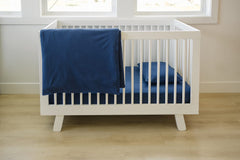 Ecolino elastic hem fitted sheet ensures snug fit on standard crib and toddler mattresses.