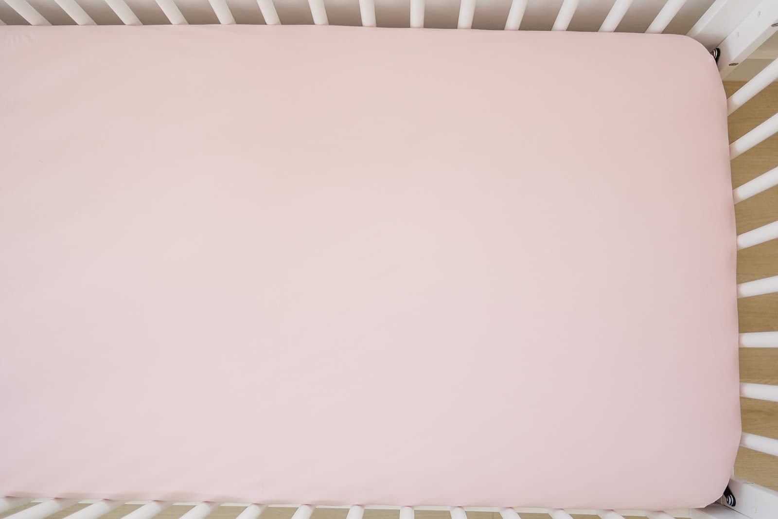 Ecolino standard crib-fit sheet fits standard cribs and toddler mattresses.