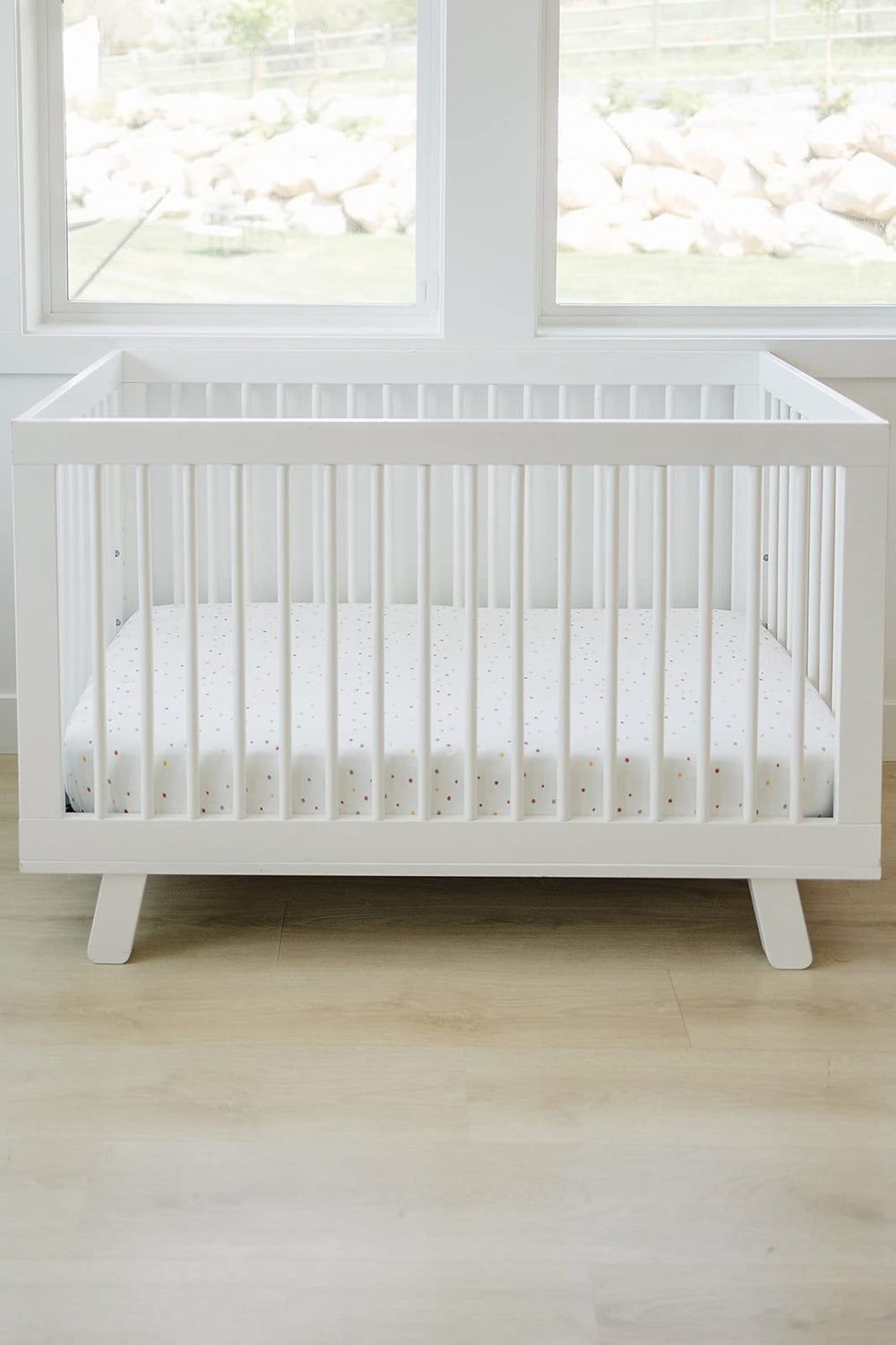 Ecolino organic cotton crib sheet closeup shows combed, ring-spun fibers for durability and softness.