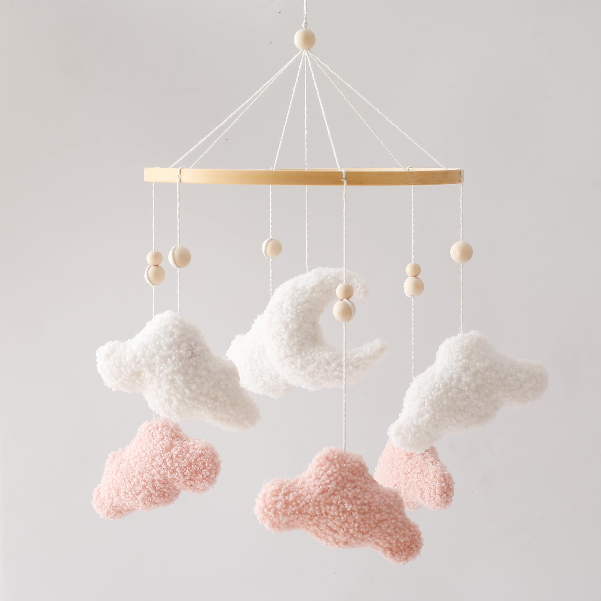 EERKEOD bunny pink clouds crib mobile calms baby's soft visuals.
