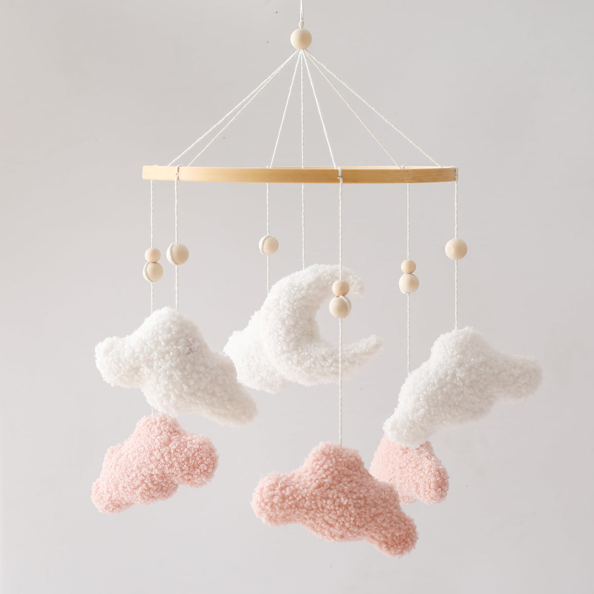 EERKEOD bunny pink clouds crib mobile calms baby's soft visuals.