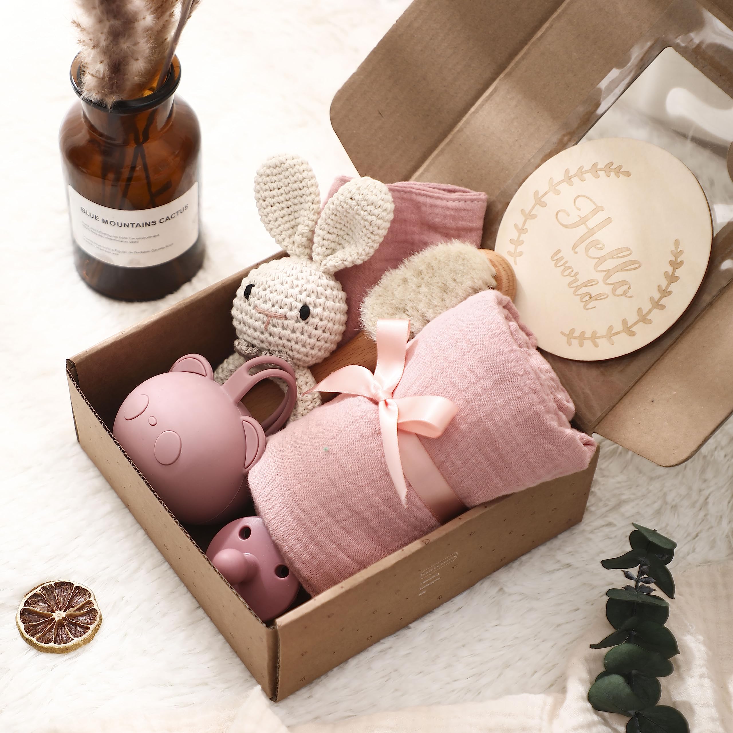 EERKEOD baby gift basket on display in a nursery-ready setup.
