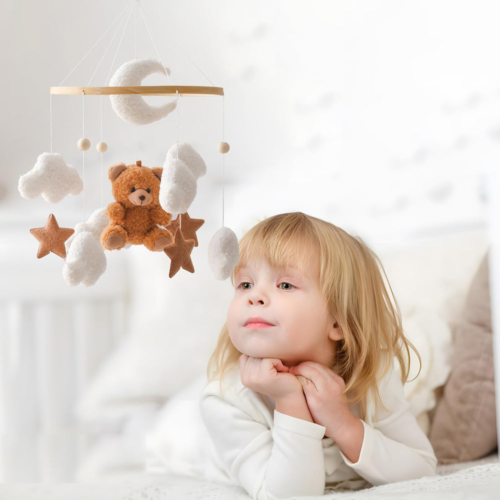 EERKEOD bell-tinted ornaments deliver gentle chimes and baby attention cues.