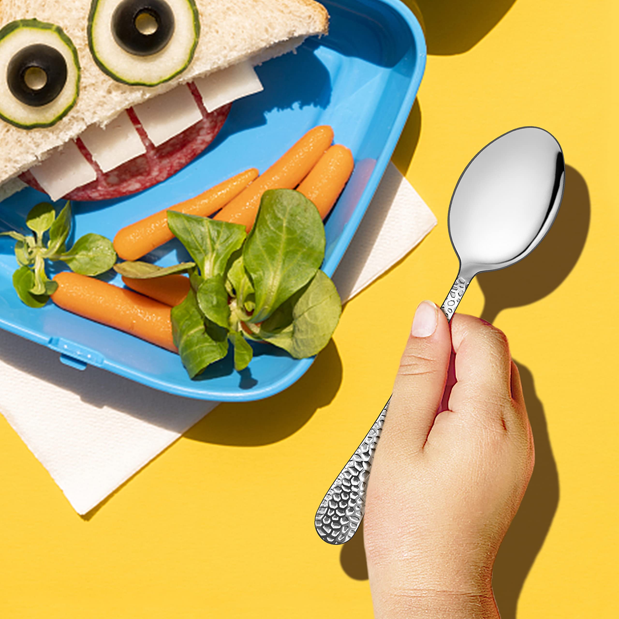E-far spoons encourage self-feeding with balanced weight and comfortable grip.