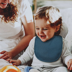 Egmao Baby colorful design bibs coordinate with outfits for teething moments.