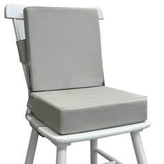 Eiury booster seat close-up on table showing secure fit and clean surface.