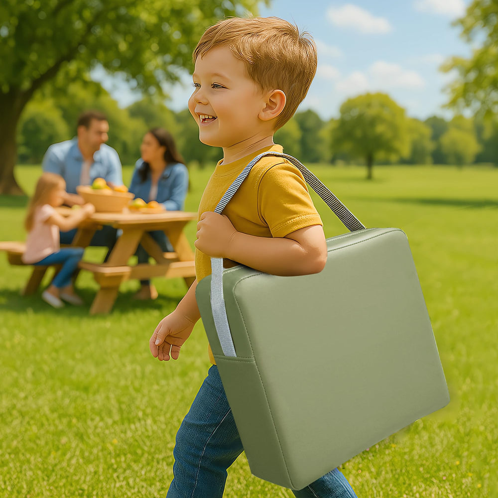 Eiury booster seat green in use on a dining table for meals.
