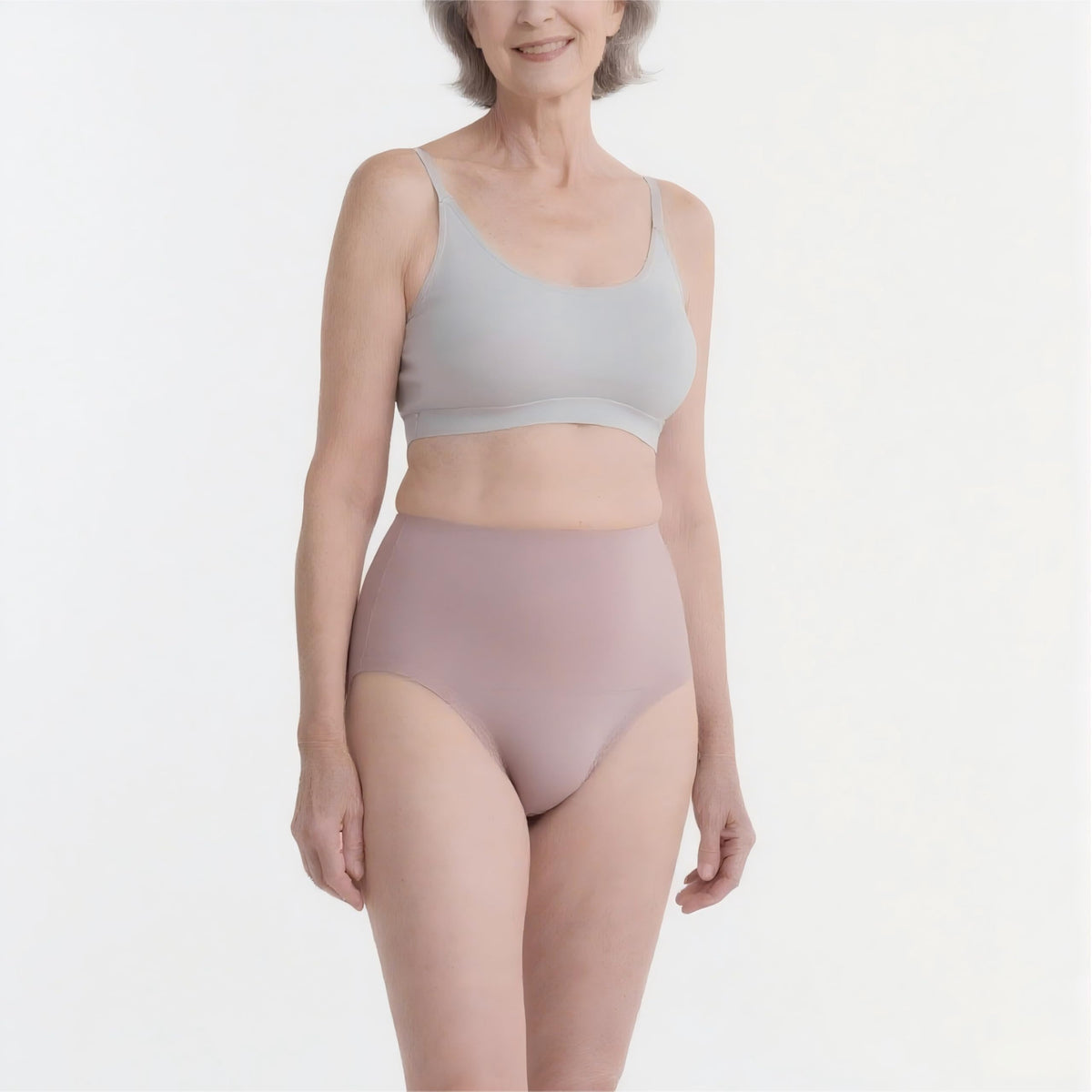 EIZNIZ high-waisted underwear in dusty pink for secure, invisible wear.