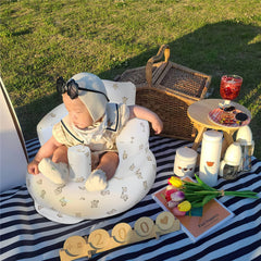 EKEPE Bear baby seat showing soft curved backrest for comfortable seating.