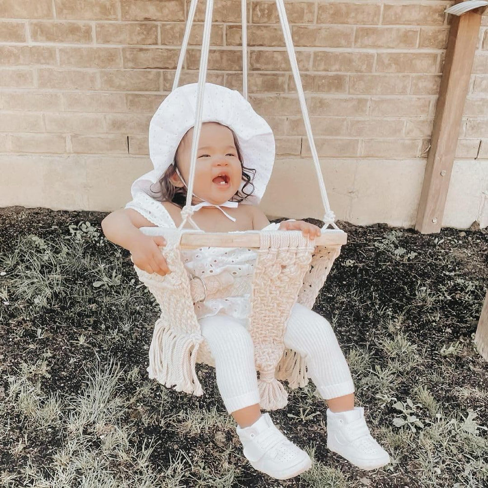 EL CLASICO OVERSEAS child-on-swing image showcasing balance-friendly fun for toddlers