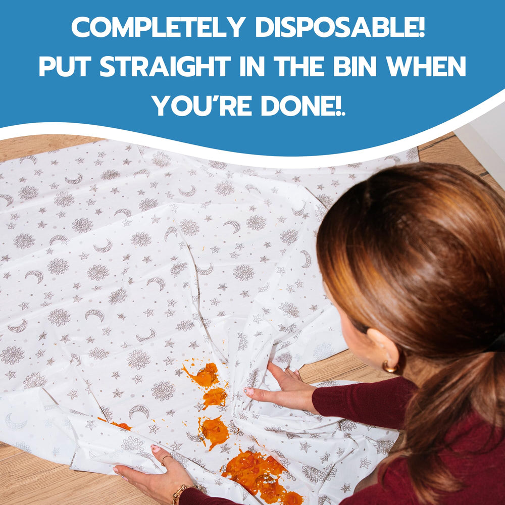 Eli with Love waterproof baby floor mat keeps spills from soaking through.
