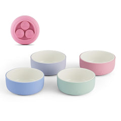 Elk and Friends kids porcelain bowls with suction sleeve on table for mess-free meals.