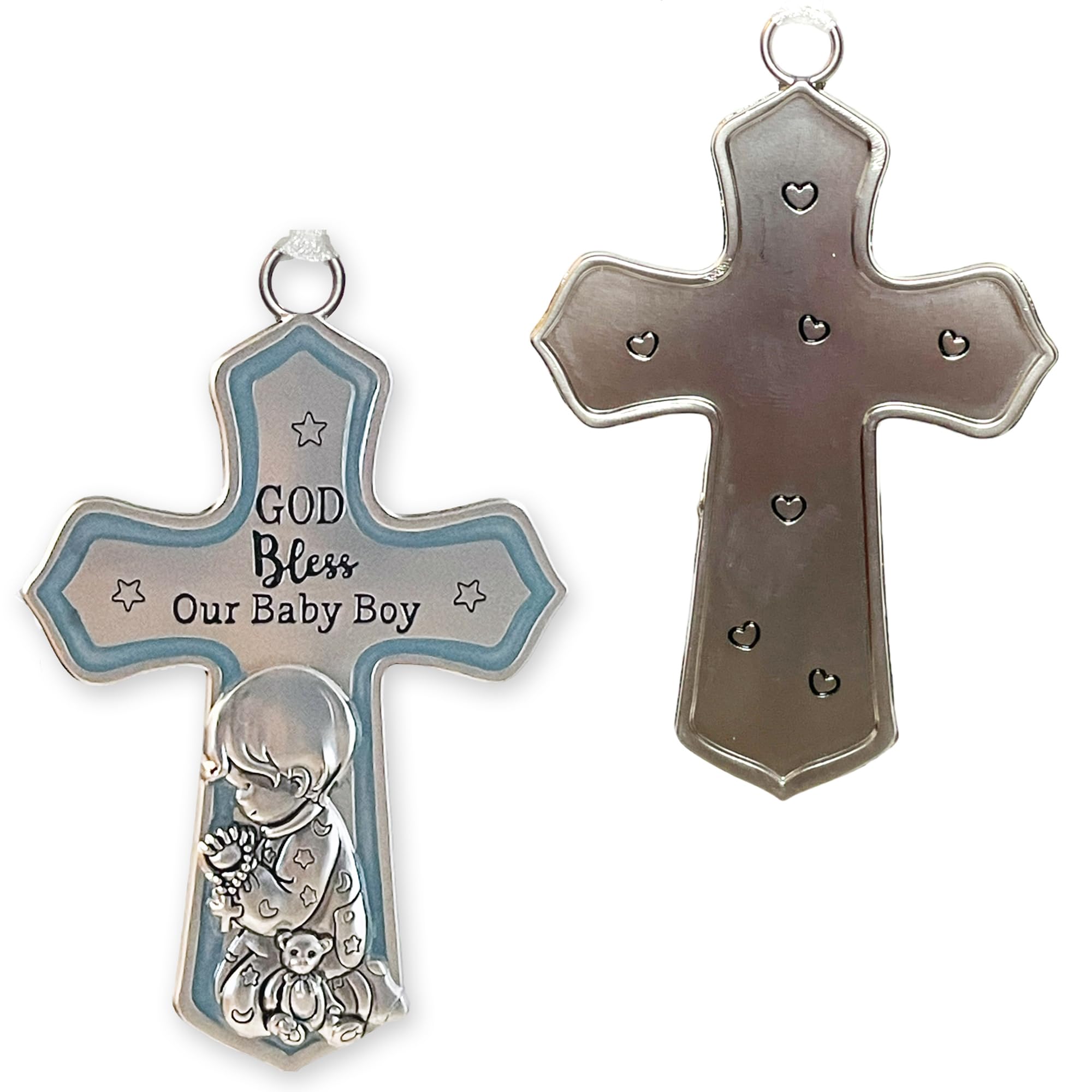 Elskandi baby dedication gift—symbolic cross and Bible that celebrate his spiritual journey.