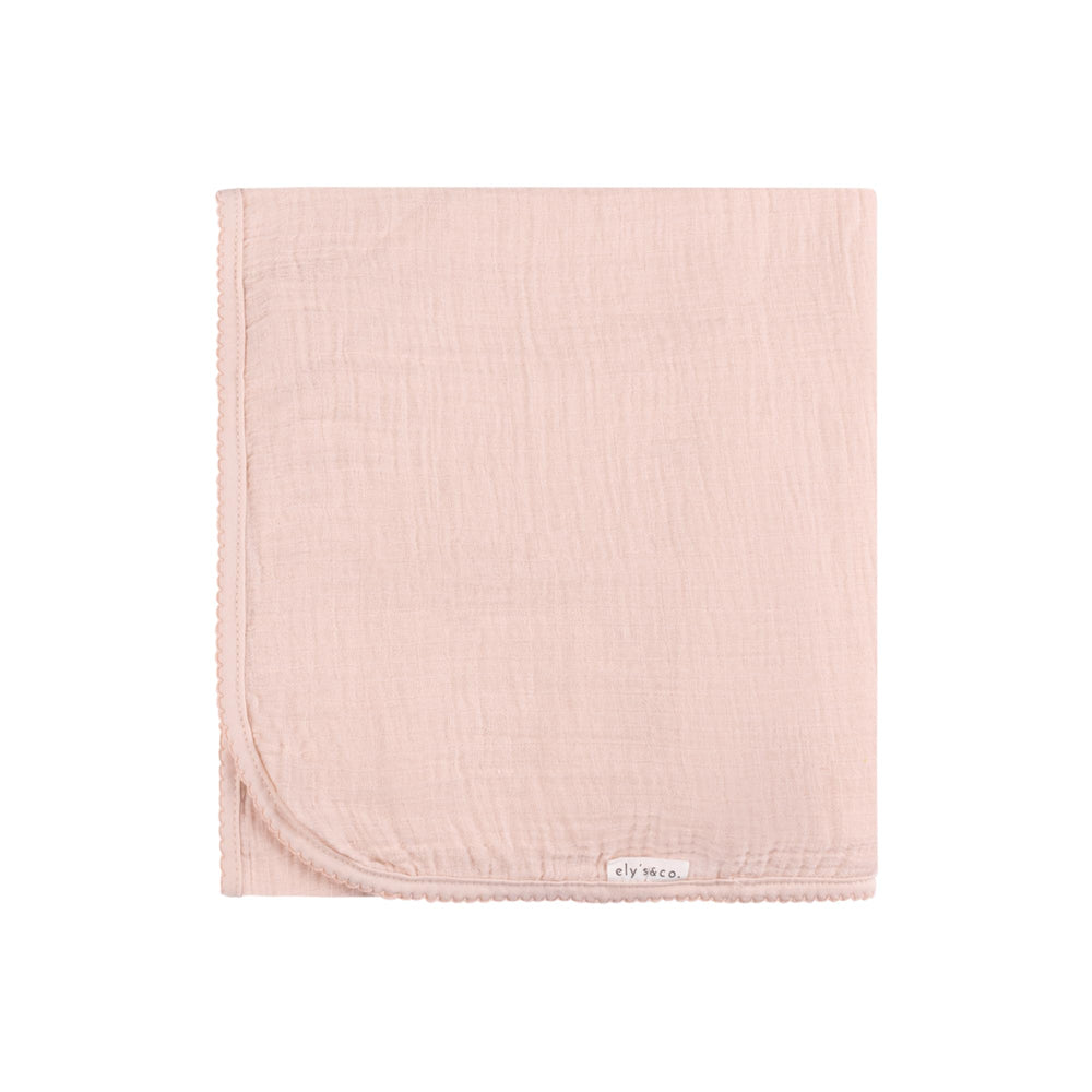 Ely's & Co baby swaddle pink scallop trim demonstrates versatile use as stroller cover.