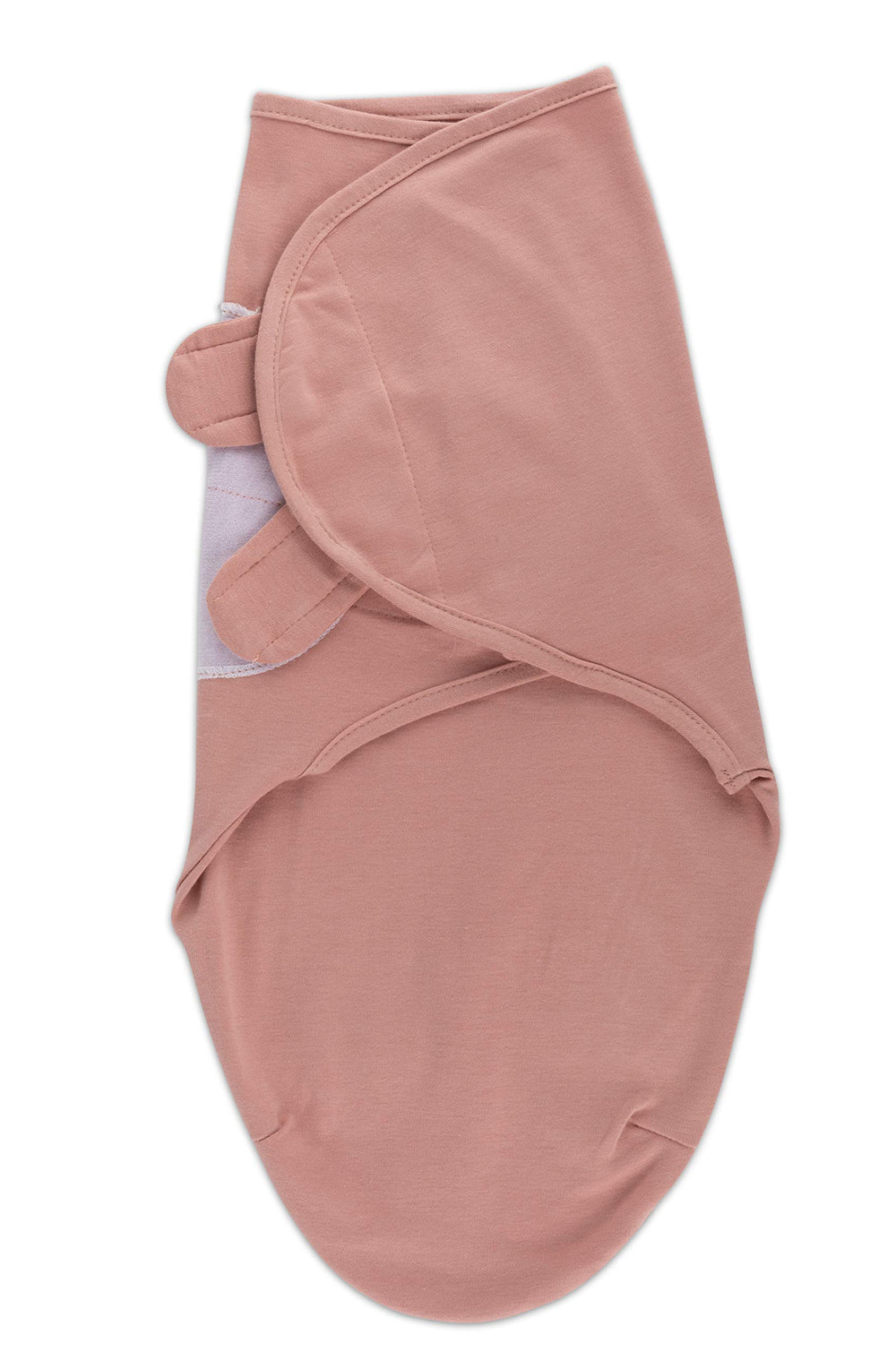 Baby snug in Ely's & Co swaddle during bonding moment