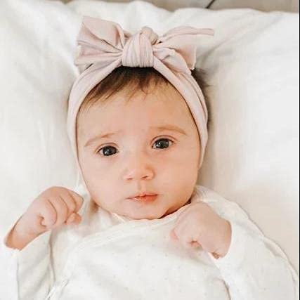 Ely's & Co. Bow Headband baby-style stretchy knit for growth