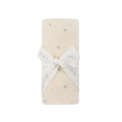Ely's & Co. cotton muslin swaddle blanket in ivory berry offers soft, breathable cuddling.