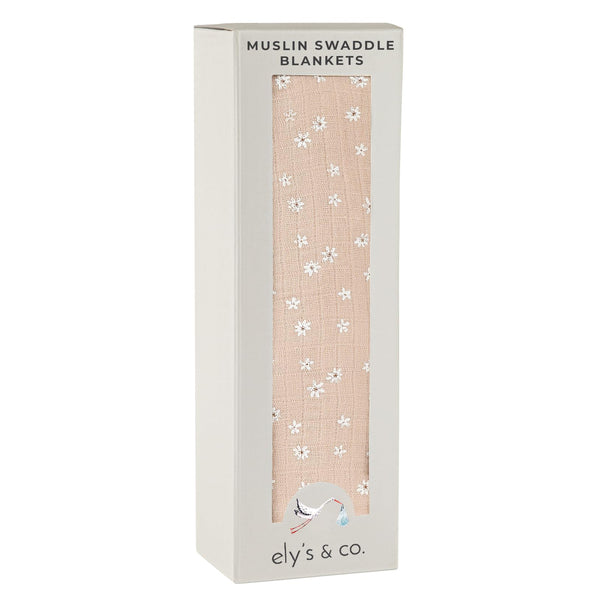 Ely's & Co. cotton muslin swaddle blanket with pink ditsy flower print for newborn comfort