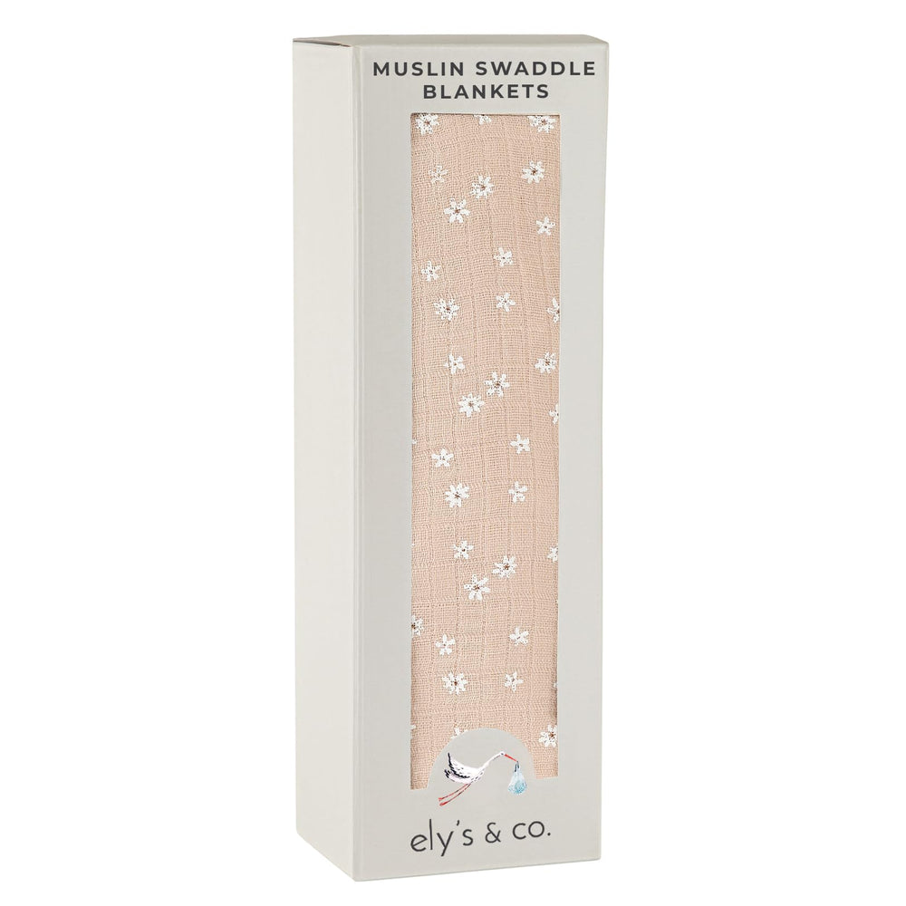 Ely's & Co. cotton muslin swaddle blanket with pink ditsy flower print for newborn comfort