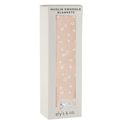 Ely's & Co. cotton muslin swaddle blanket with pink ditsy flower print for newborn comfort